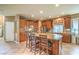 Well-equipped kitchen with a center island, stainless steel appliances, and ample cabinet space at 6046 Bassio Ave, Las Vegas, NV 89141