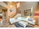 Spacious living room featuring stylish decor and a staircase leading to the upper level at 6046 Bassio Ave, Las Vegas, NV 89141