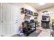 Bonus room features an arcade game, toy cars, and ample storage space at 6047 Ancient Peaks Ave, Las Vegas, NV 89141