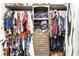 Walk-in closet with well organized clothing, shelving, and ample storage space at 6047 Ancient Peaks Ave, Las Vegas, NV 89141