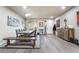 Bright dining area with a rustic table, bench seating, and elegant decor at 6047 Ancient Peaks Ave, Las Vegas, NV 89141