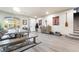 Charming dining space with a large table, comfortable seating, and modern light fixture at 6047 Ancient Peaks Ave, Las Vegas, NV 89141