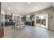 Open kitchen with dark cabinetry, stainless steel appliances, and a view of the backyard at 6047 Ancient Peaks Ave, Las Vegas, NV 89141