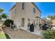 Cozy backyard featuring a patio seating area, built-in grill, and well-maintained landscaping at 6236 Desert Haven Rd, Las Vegas, NV 89130