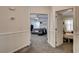 Hallway showing doors leading to bedrooms, highlighting the layout and flow of the upper level at 6236 Desert Haven Rd, Las Vegas, NV 89130