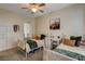 Bright bedroom with twin beds, decorative artwork, and plenty of storage, offering a cozy and functional space at 6236 Desert Haven Rd, Las Vegas, NV 89130