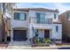 Charming two-story home featuring a balcony, cozy porch and an attached garage in a well-maintained neighborhood at 6299 Oread Ave, Las Vegas, NV 89139