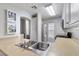 A clean kitchen featuring stainless steel appliances, light countertops, and white cabinets at 6299 Oread Ave, Las Vegas, NV 89139