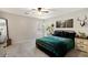 Comfortable primary bedroom with neutral tones, natural light, and a cozy ambiance at 6299 Oread Ave, Las Vegas, NV 89139
