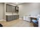 Contemporary home office with gray cabinets, stainless appliances, and work space at 6433 Farness St, Las Vegas, NV 89135