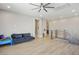 Light filled upstairs loft with hardwood floors and modern railing, perfect for relaxing or entertaining at 6433 Farness St, Las Vegas, NV 89135