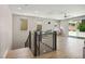 Spacious upstairs landing with a modern ceiling fan and a view to the backyard at 6433 Farness St, Las Vegas, NV 89135