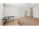 Bedroom with wood-look floors, neutral walls and a window with blinds at 6711 W Charleston Blvd # 4, Las Vegas, NV 89146