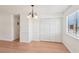 Dining space with wood floors, wainscoting and a modern chandelier at 6711 W Charleston Blvd # 4, Las Vegas, NV 89146