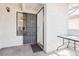 A secure condo entrance with a gated patio area and neutral color scheme at 6711 W Charleston Blvd # 4, Las Vegas, NV 89146