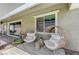Cozy back patio with comfortable egg chairs, perfect for relaxing and enjoying the outdoors at 689 Moonstone Beach Pl, Henderson, NV 89011