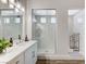 Modern bathroom with a glass shower, bright lighting, and luxurious finishes at 689 Moonstone Beach Pl, Henderson, NV 89011