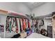 Walk-in closet featuring ample hanging space and storage solutions at 689 Moonstone Beach Pl, Henderson, NV 89011