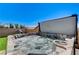 Inviting outdoor hot tub filled with bubbling water and cascading jets at 689 Moonstone Beach Pl, Henderson, NV 89011