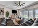 Living area with large windows and access to outdoor space at 689 Moonstone Beach Pl, Henderson, NV 89011