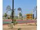 Community playground with basketball courts, climbing structures, and open space for active play at 689 Moonstone Beach Pl, Henderson, NV 89011