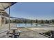 Community pool with picnic tables and mountain views, perfect for relaxation and recreation at 689 Moonstone Beach Pl, Henderson, NV 89011