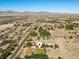 This aerial view of the property showcases its proximity to neighborhood amenities and desert landscaping at 7350 W Rome Blvd, Las Vegas, NV 89131
