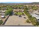 An aerial view of a property with a spacious lot, pool, and mature landscaping at 7350 W Rome Blvd, Las Vegas, NV 89131