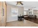 Cozy dining area adjacent to the living room features ample natural light and easy access to living areas at 7350 W Rome Blvd, Las Vegas, NV 89131