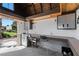Well-lit workshop featuring a workbench, storage cabinets, and ample workspace at 7350 W Rome Blvd, Las Vegas, NV 89131