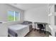 Bedroom featuring a window, desk, and modern decor at 7361 Ringquist St, Las Vegas, NV 89148