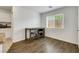 Bright breakfast nook with a modern table, comfortable seating and laminate floors at 7361 Ringquist St, Las Vegas, NV 89148