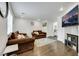 Inviting living room with neutral tones, sleek floors, and a modern entertainment setup at 7361 Ringquist St, Las Vegas, NV 89148