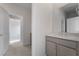 Bathroom with a modern vanity, stylish fixtures, and access to another room at 789 Black Palace St, Henderson, NV 89011