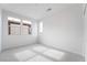 Bright bedroom featuring plush carpeting, fresh paint, and natural light from multiple windows at 789 Black Palace St, Henderson, NV 89011
