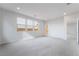Well-lit bedroom offers soft carpeting and large windows, creating a cozy and inviting space at 789 Black Palace St, Henderson, NV 89011