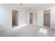 Spacious bedroom with carpeting and multiple doorways, providing easy access and flow at 789 Black Palace St, Henderson, NV 89011