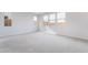 The spacious bedroom features soft carpet and multiple windows for natural light at 789 Black Palace St, Henderson, NV 89011