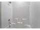 Shower stall featuring white tile and a built-in shelf, clean and modern at 789 Black Palace St, Henderson, NV 89011