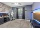 Bedroom features a unique design with storm trooper figurine, fish tank, and TV at 8566 Burning Bridge Ct, Las Vegas, NV 89131