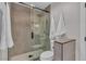 Modern bathroom featuring a glass-enclosed shower with beautiful tile and mosaic floors at 8848 Rainbow Ridge Dr, Las Vegas, NV 89117