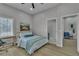 Bedroom with a work desk and a neatly made bed at 8848 Rainbow Ridge Dr, Las Vegas, NV 89117
