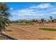 Scenic view of the golf course with mountains and blue skies in the background at 8848 Rainbow Ridge Dr, Las Vegas, NV 89117