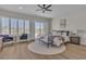 This spacious main bedroom features natural light, deck access, and a stylish ceiling fan at 8848 Rainbow Ridge Dr, Las Vegas, NV 89117
