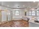 Spacious primary bathroom with a soaking tub, glass shower, and and vanities at 9124 Sapphire Ridge Ave, Las Vegas, NV 89129