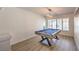 Spacious game room featuring a stylish billiard table with modern lighting and ample space for entertainment at 9124 Sapphire Ridge Ave, Las Vegas, NV 89129
