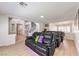 Home theater with leather recliners, game machine, and open floorplan for easy entertaining and relaxation at 9124 Sapphire Ridge Ave, Las Vegas, NV 89129