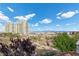 Expansive city views from property, with lush landscaping and architectural features at 9301 Verlaine Ct, Las Vegas, NV 89145