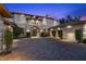Elegant home featuring a large driveway and a well-manicured front yard at 9301 Verlaine Ct, Las Vegas, NV 89145