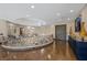 Elegant foyer with hardwood floors, wrought iron railing, chandelier and art niches at 9301 Verlaine Ct, Las Vegas, NV 89145